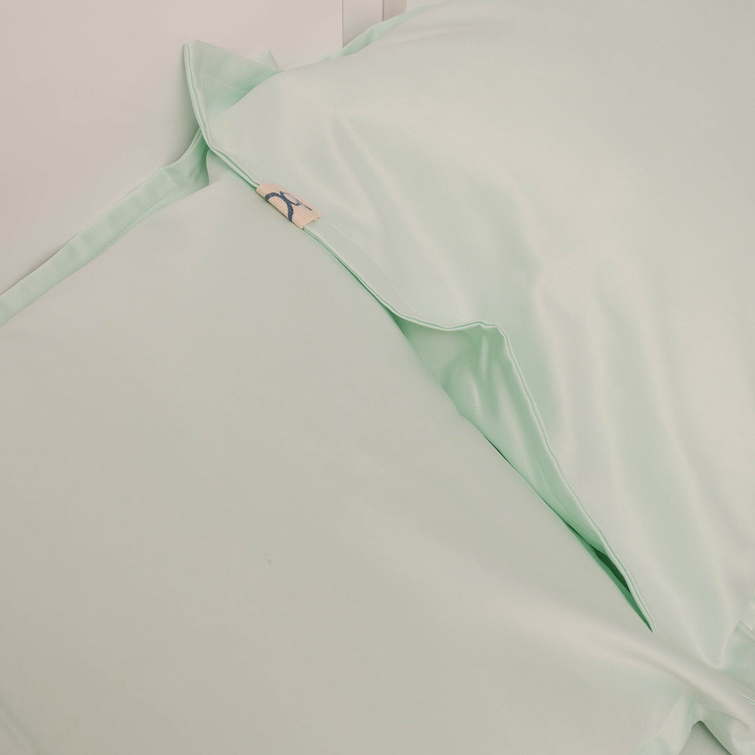 Silky satin bedsheet fabric detail and sheen