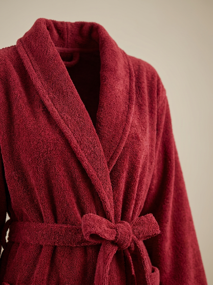 Red cotton bathrobe fabric close-up