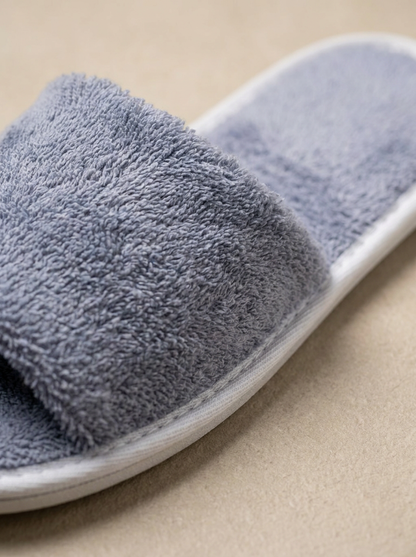 Grey cotton slipper texture close-up