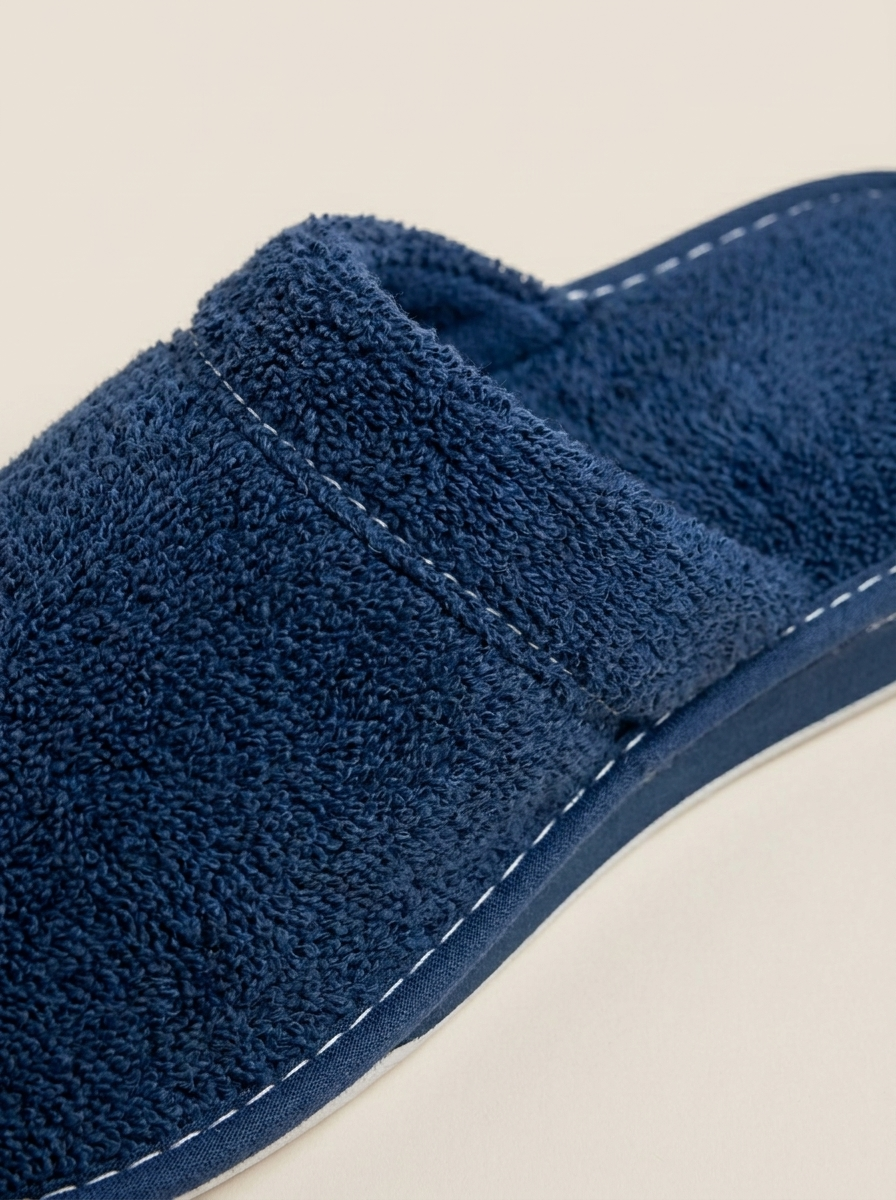 Navy cotton slipper texture close-up