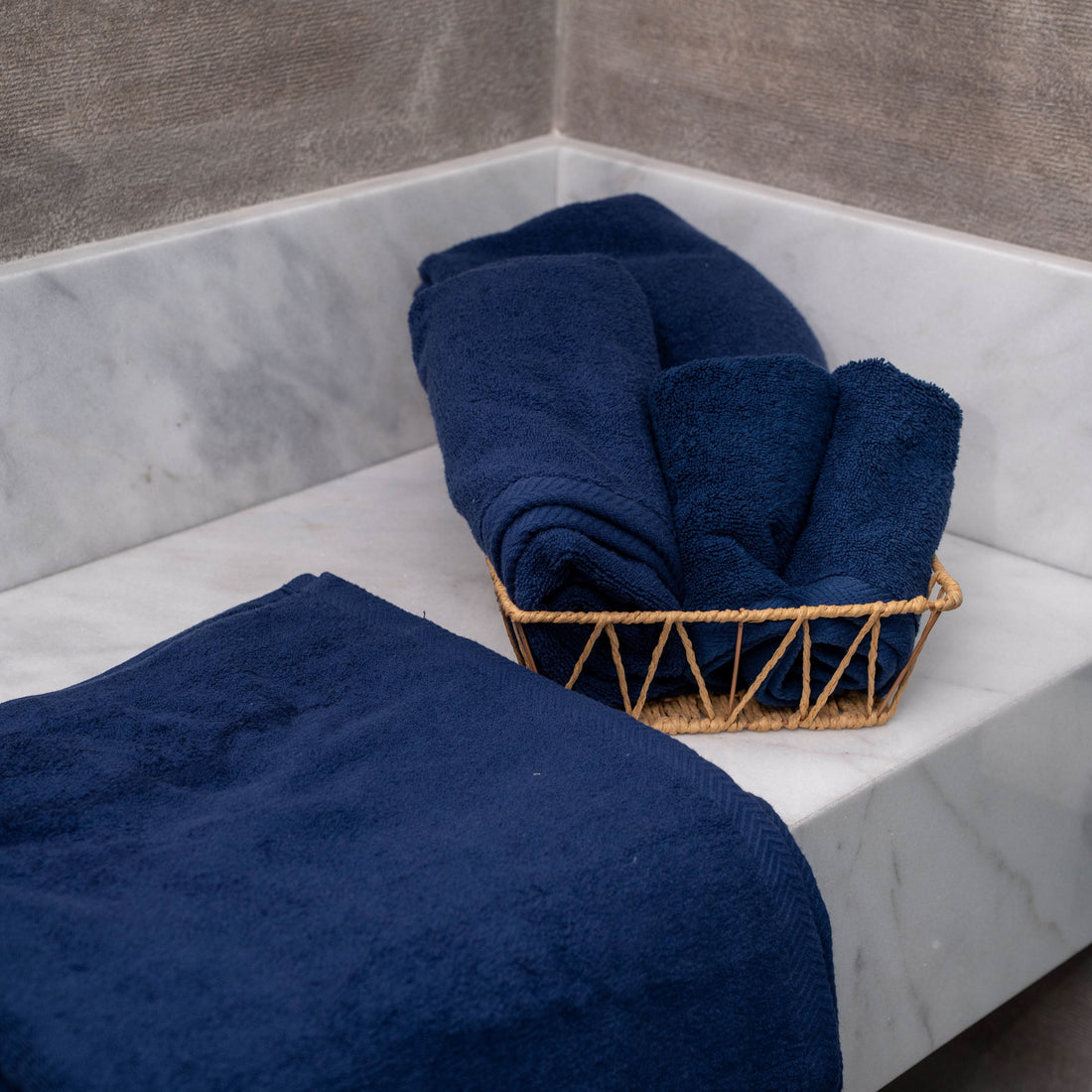 Navy 100% cotton towel folded